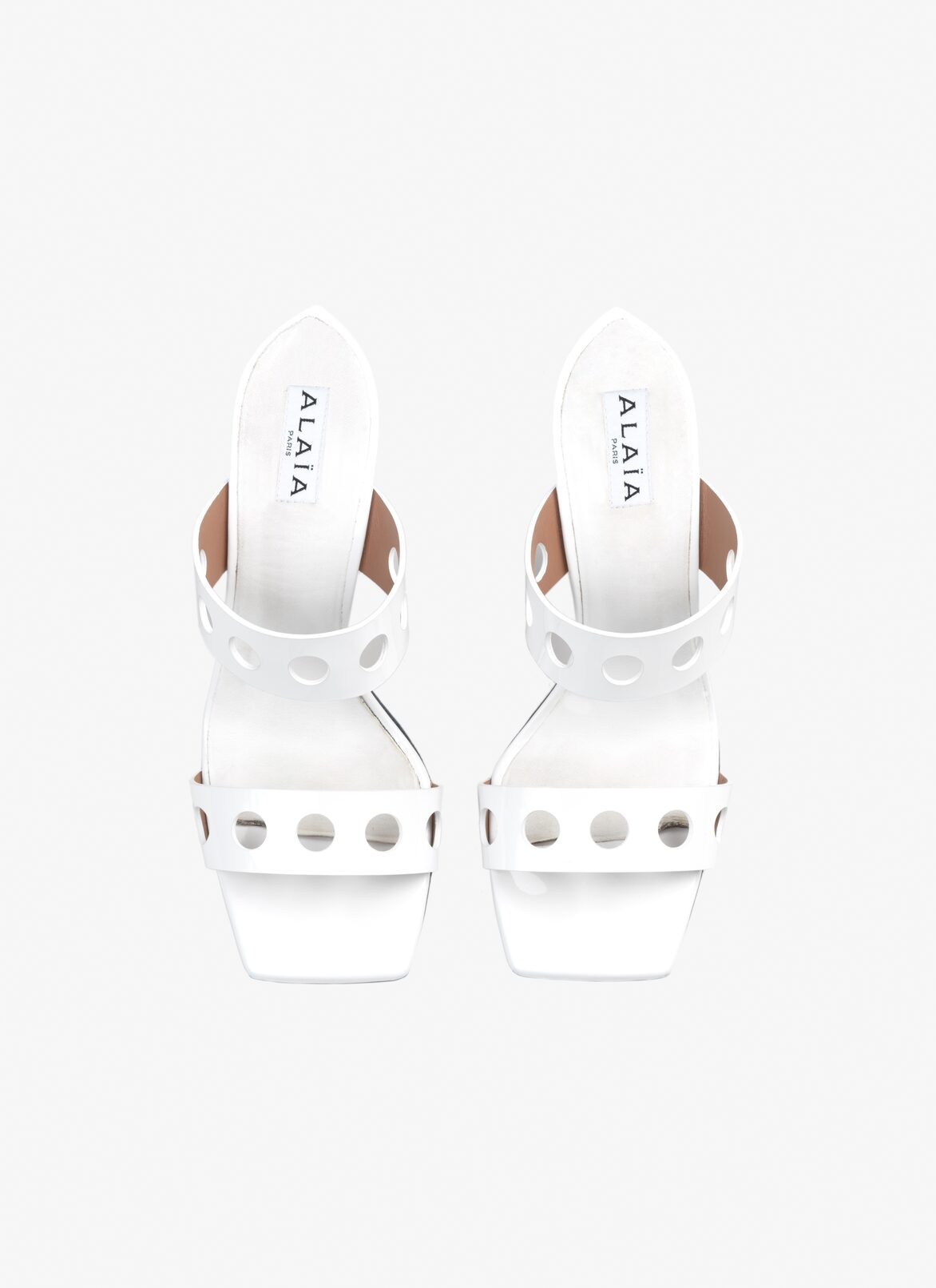 Perforated sandals in patent calfskin ALAÏA OPTIC WHITE PERFORATED SANDALS IN PATENT CALFSKIN